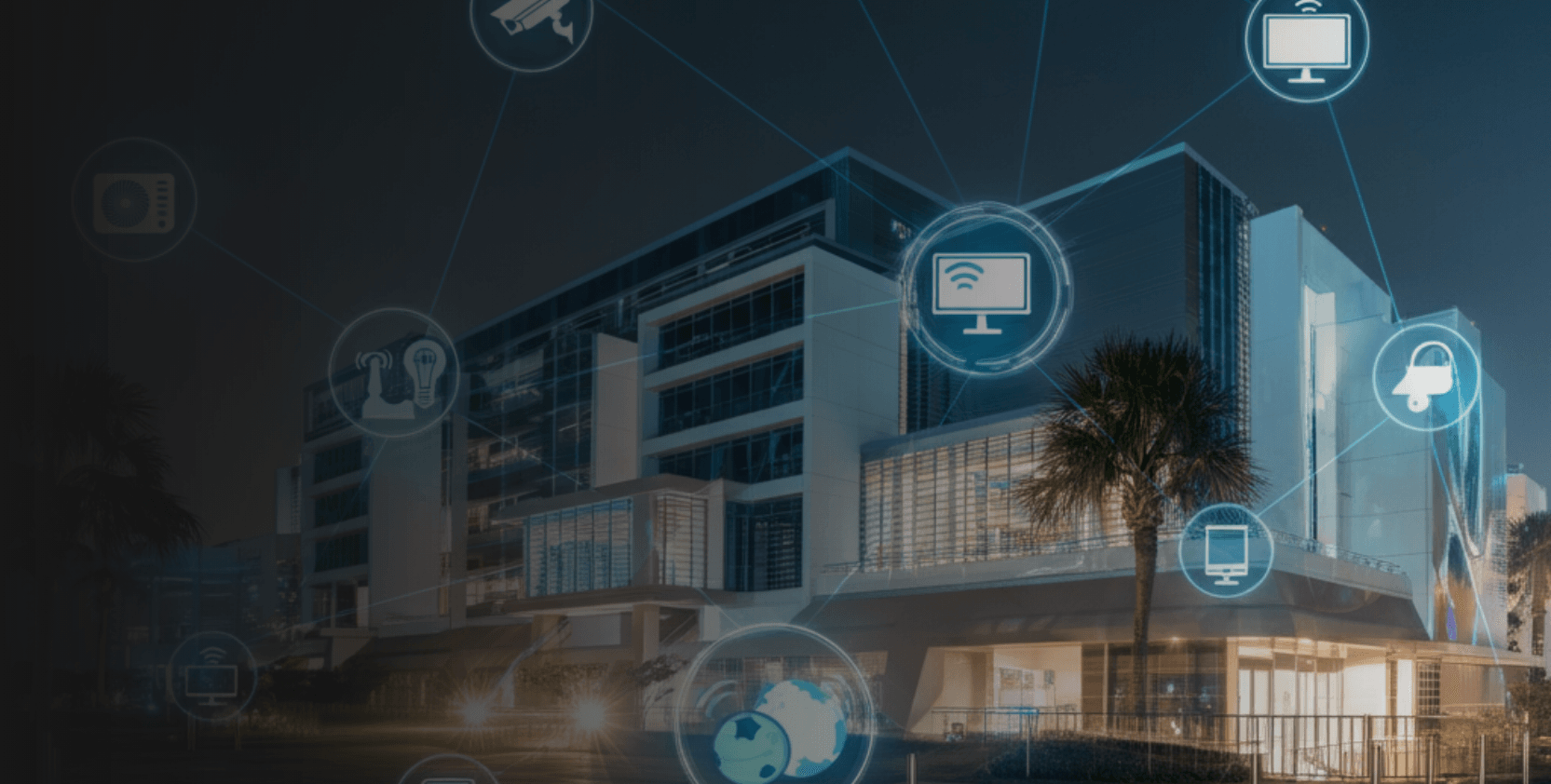Landscape view of a smart building with a glowing network, representing comprehensive device management. 