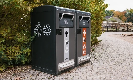 A dust bin with a biodegradable waste compartment promoting sustainability