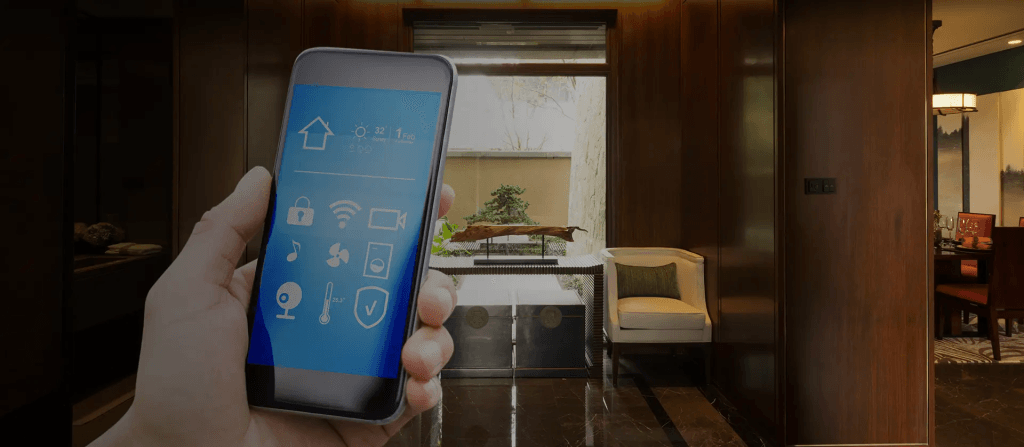 A hospitality operator using mobile to perform real time energy monitoring for smart hotel room.
