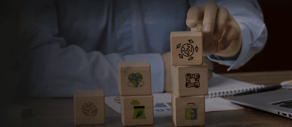 Man keeping wooden blocks showcasing sustainable facility management at work