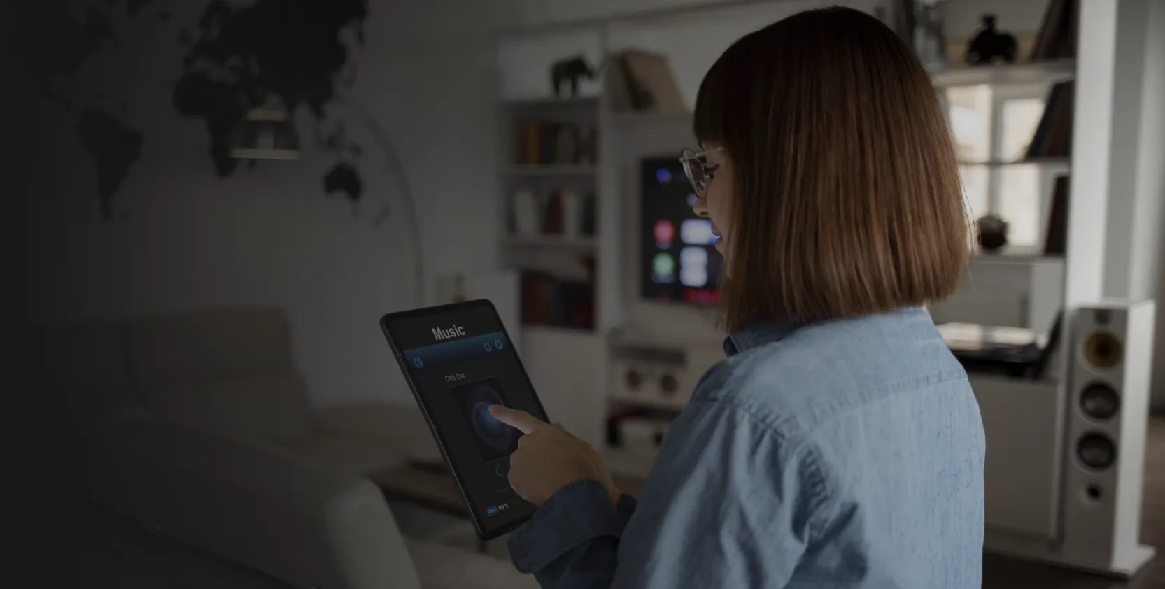 Woman monitoring audio with smart facility management app