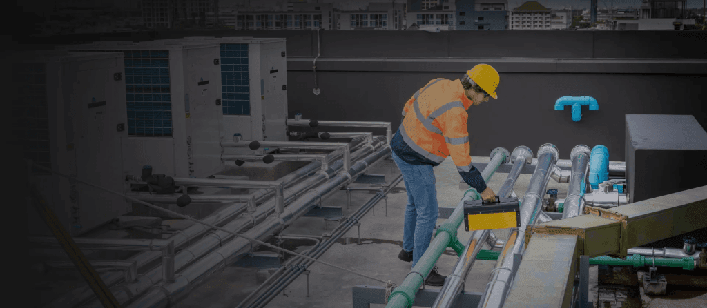 Staff member carrying a kit box arrives at the location of a maintenance requested through facility management software.